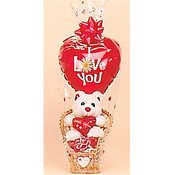 Bear on a small Chair holding a small Heart and a