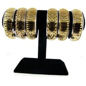 Gold Bangle Bracelets on Stand