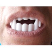 White vampire fangs