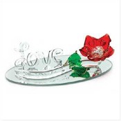 Red Rose On Base With 'Love'